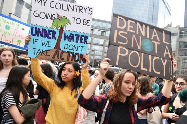 Students at a Fridays For Future climate change protest in New York City in March